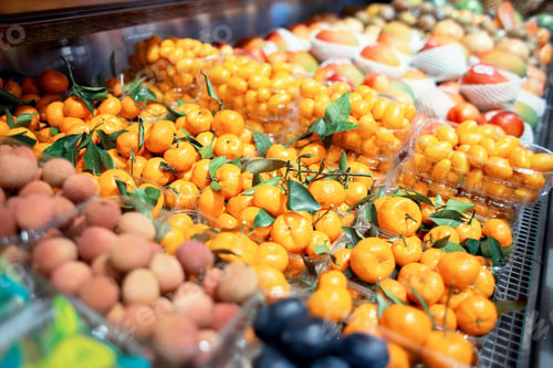 Vista previa: Counter in the store with citrus fruits.