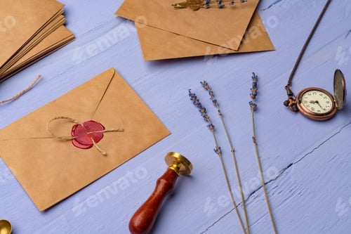 Preview: Handmade paper envelope on lavender wooden table