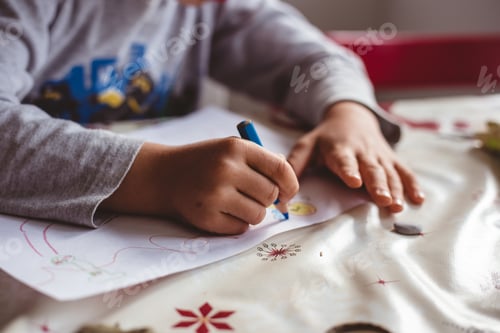 Preview: Child drawing with colorful pencils