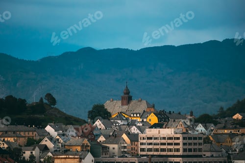 Preview: Alesund, Norway. Alesund Skyline Cityscape. Historical Center In Summer Evening. Old Aspoy School