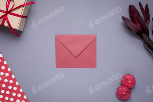 Preview: Present card and gift in box with satin ribbon on gray background