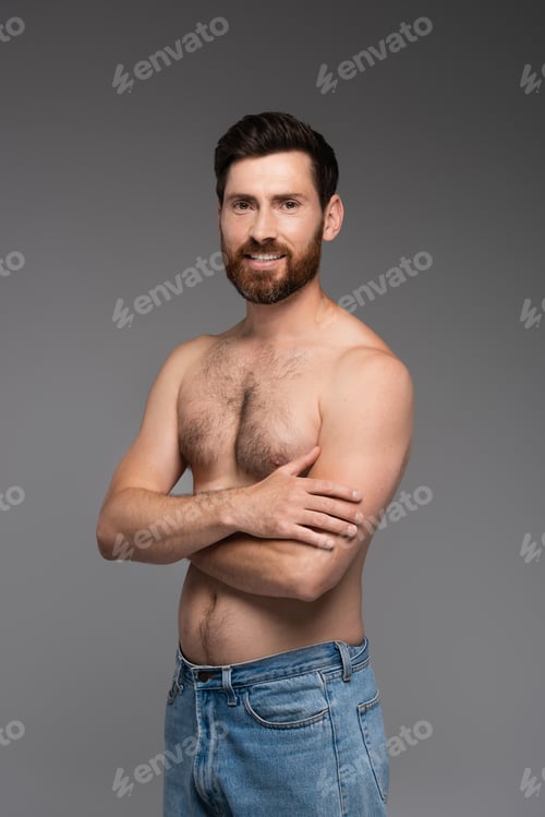 Preview: shirtless and happy man with hair on chest smiling isolated on grey