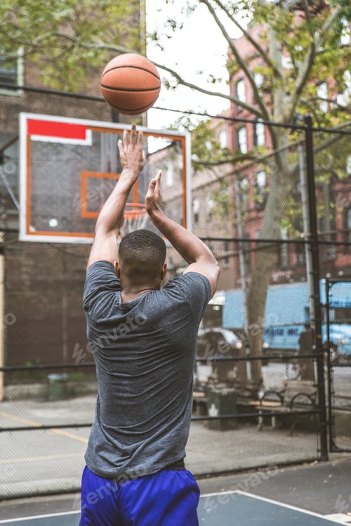 Preview: Basketball player training outdoors