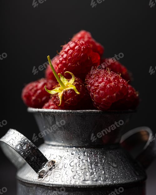 Preview: Raspberries in a metal jar close up
