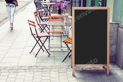 Preview: Blank cafe blackboard on the street