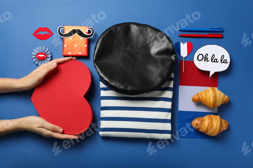 Preview: Concept of France, visual symbols of the country, on a blue background.