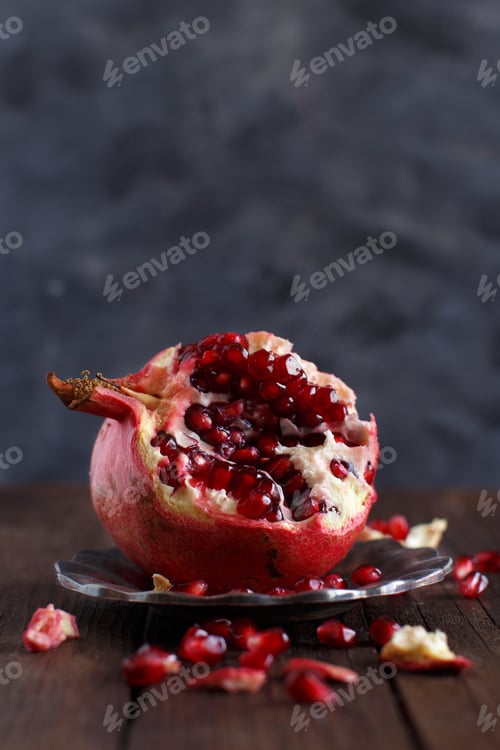 Preview: Open fresh ripe pomegranates