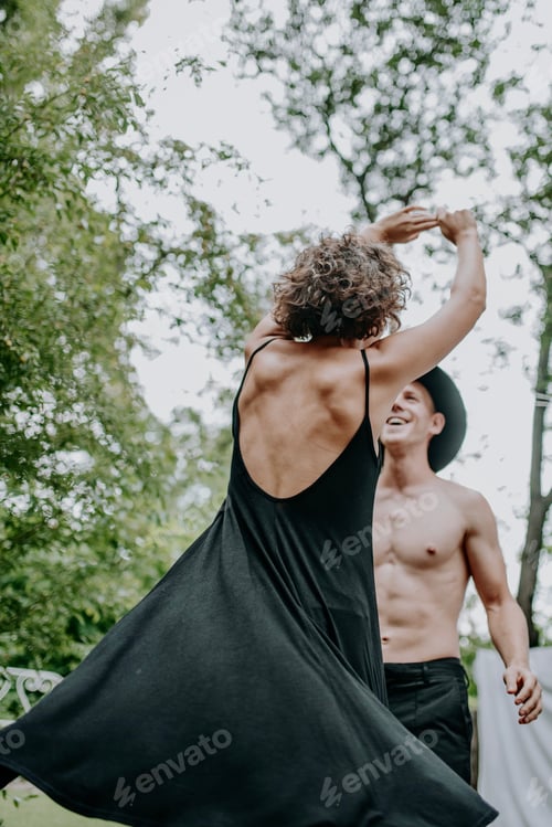 Preview: Millennial in love happy couple in relaxation have fun and dancing