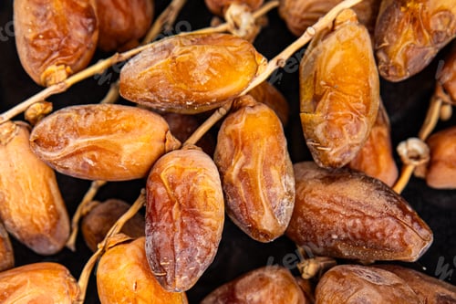 Preview: date on a branch dried sweet fruit fresh appetizer meal food snack on the table copy space food