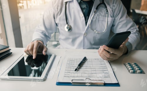 Preview: Asian doctor using the tablet explaining the patient condition and the treatment result.