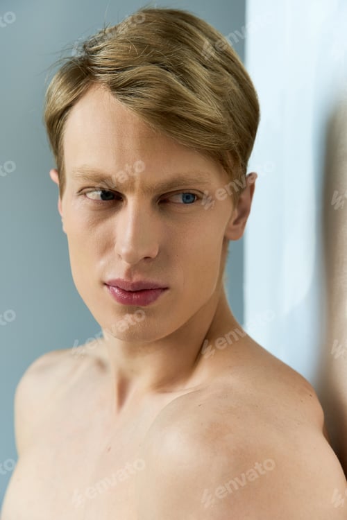 Preview: Young alluring man showcases modern masculinity with confidence and charm