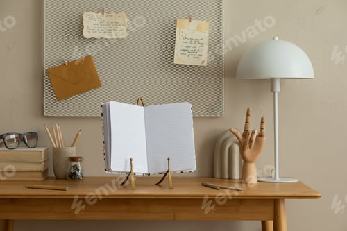 Preview: Creative composition of workplace interior with mock up poster frame
