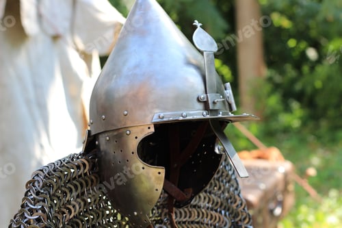 Preview: Knight's armor: helmet and chain mail on a blurry background.