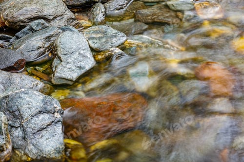 Preview: long exposure of a River stream on mountain valley.