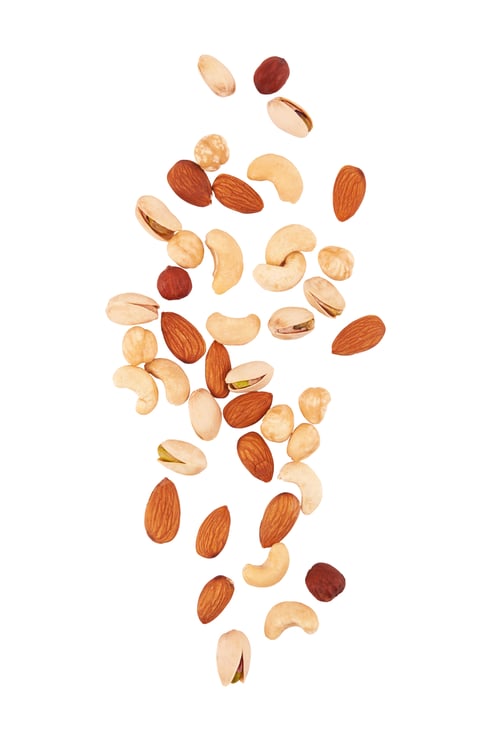 Preview: Heap of mixed nuts isolated on white background