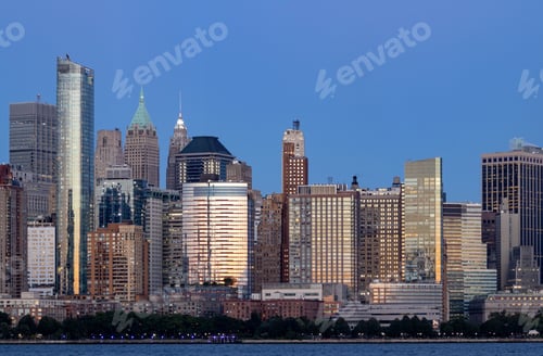 Preview: Large skyscrapers in downtown New York at sunset
