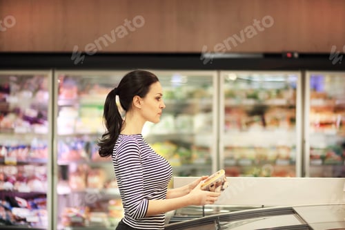 Preview: Women Choosing A Dairy Products At Supermarket