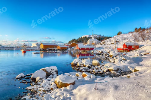 Preview: Outstanding winter scenery of Moskenes village with ferryport and famous Moskenes parish Church.