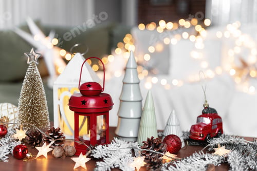 Preview: Various home Christmas or New Year decorations composition at coffee table