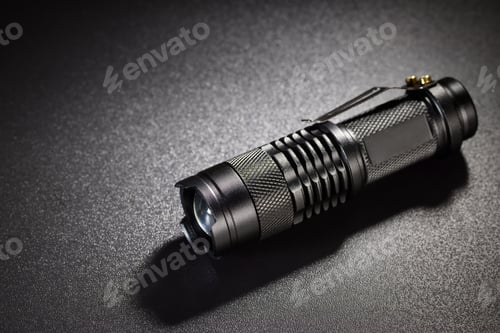 Preview: Black metallic flashlight or torch