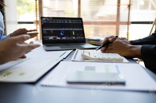 Preview: Financial advisors to analyze production costs and analyze marketing charts in business report.
