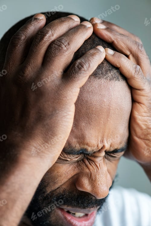 Preview: Black man suffering from migraine
