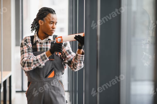 Preview: African American Skilled technician repairing air conditioning system