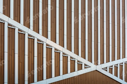 Preview: Modern building facade with geometric metal and wood panels forms dynamic pattern