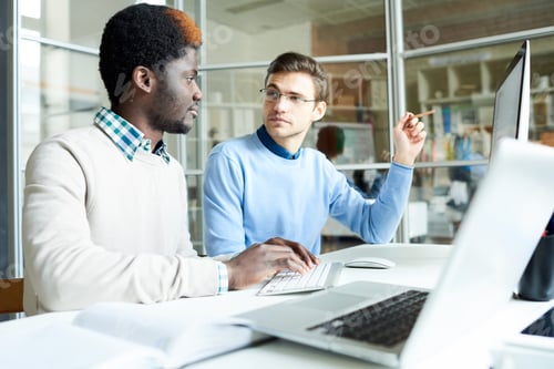 Preview: Two IT Programmers Working in Office
