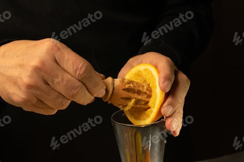 Preview: Squeezing fresh orange for juice
