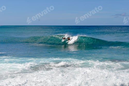 Preview: Surfer catching a wave.