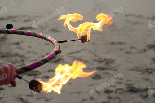 Preview: Fire dancing on beach with hoop
