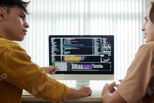 Preview: Man Explaining Programming Code to Friend