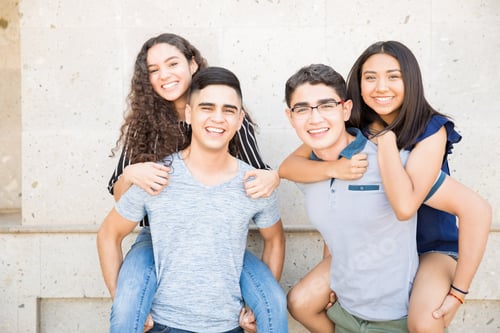 Preview: Teenage friends enjoying themselves outside