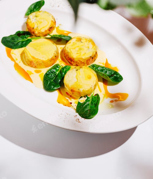 Preview: Baked potato medallions with spinach and creamy sauce