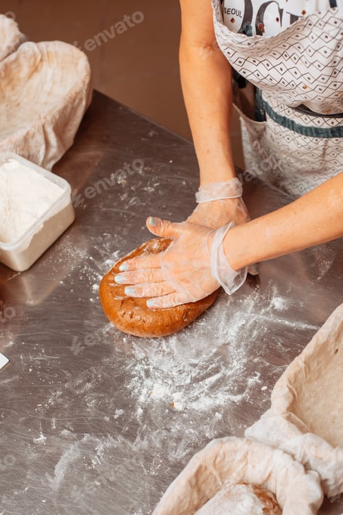 Preview: baker shaping dough for bread