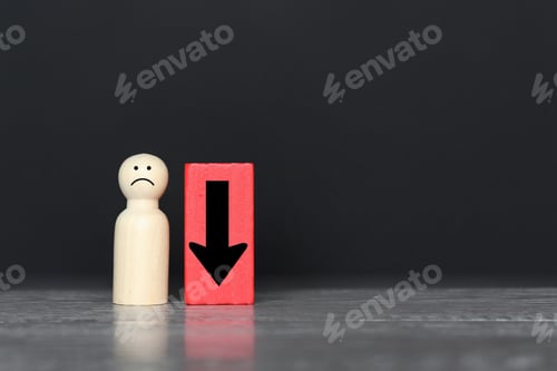 Preview: Wooden doll and downward arrow with copy space.
