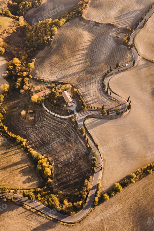 Preview: Aerial drone landscape of famous Tuscany hills, Italy. Abstract view of curved serpentine road