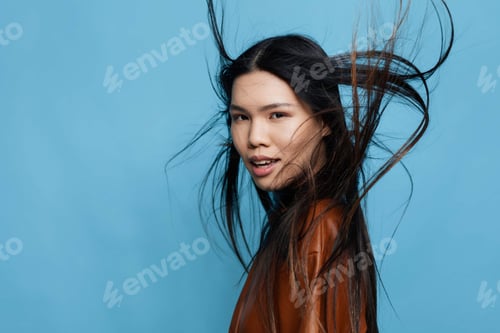 Preview: Woman blue smile happy background studio asian girl