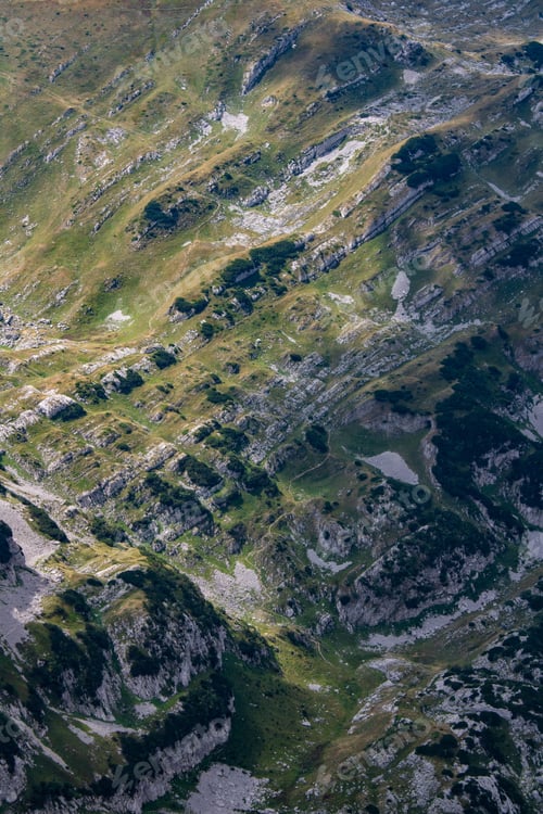 Preview: Vertical aerial shot of a beautiful landscape of Durmitor mountains in Montenegro