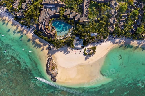 Preview: View from the height of the east coast of the island of Mauritius. Flying over the turquoise lagoon