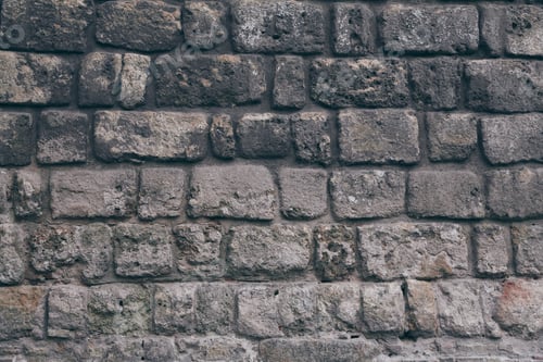 Preview: close-up shot of black aged brick wall for background