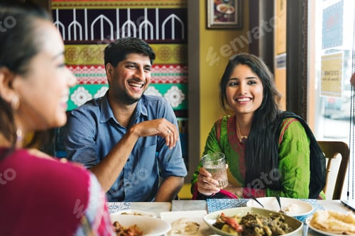 Preview: A group of Indian people is having lunch together