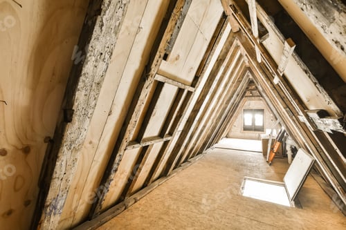 Preview: the attic of a house being renovated with wooden beams