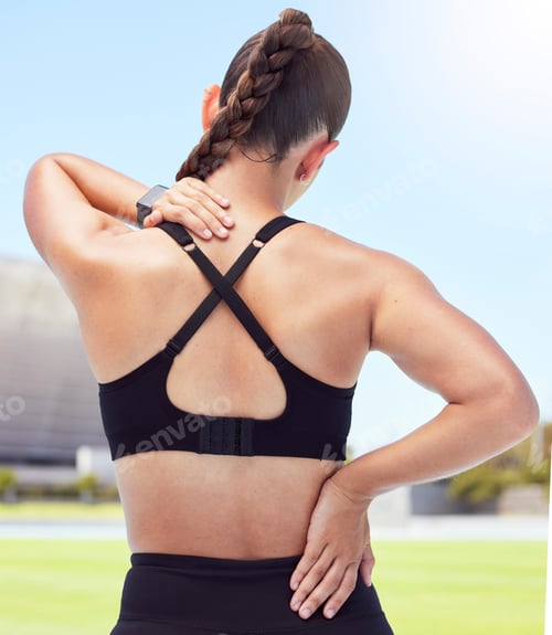 Preview: Fitness woman back pain, spine injury and neck problems at sports training stadium outdoors. Athlet