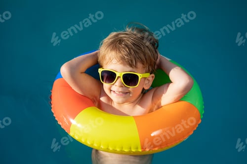 Preview: Happy child swimming on summer vacation