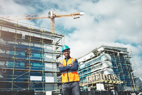 Preview: Portrait of a confident young man working at a construction site