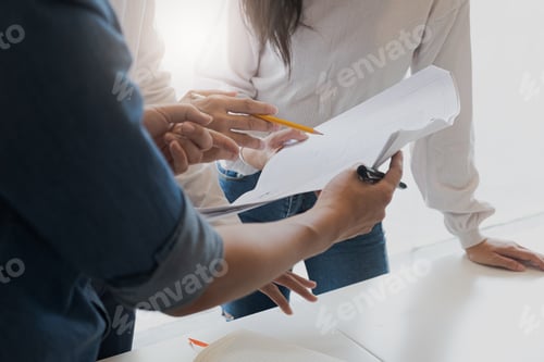 Preview: business people group on meeting and presentation in bright modern office with construction engineer