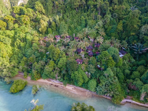 Preview: Railay beach Krabi Thailand, tropical beach of with backpacker bamboo hut in the jungle