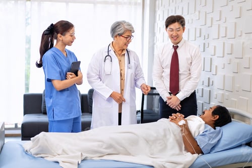 Preview: Hospital treatment room relative visit patient lay on bed doctor explain update illness condition